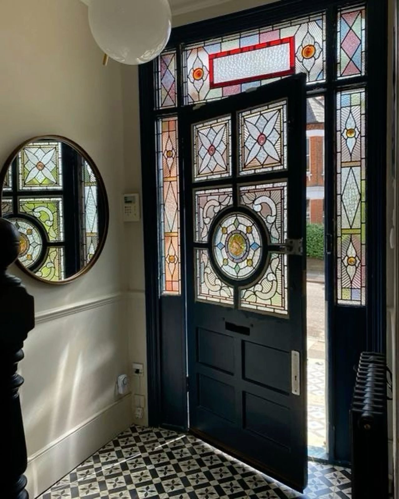 Panelled front entrance and door case